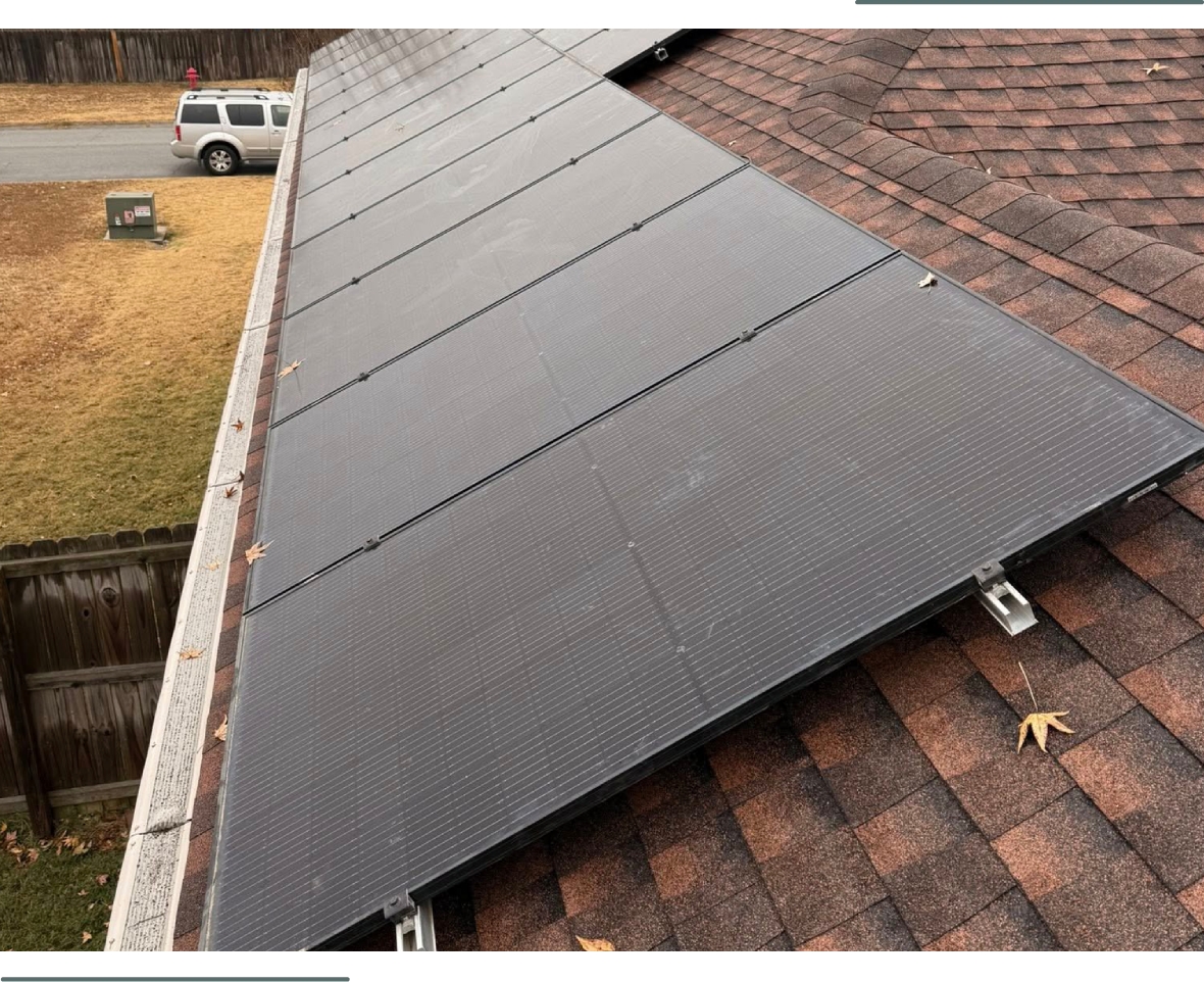 Close-up of solar panels installed on a residential roof.